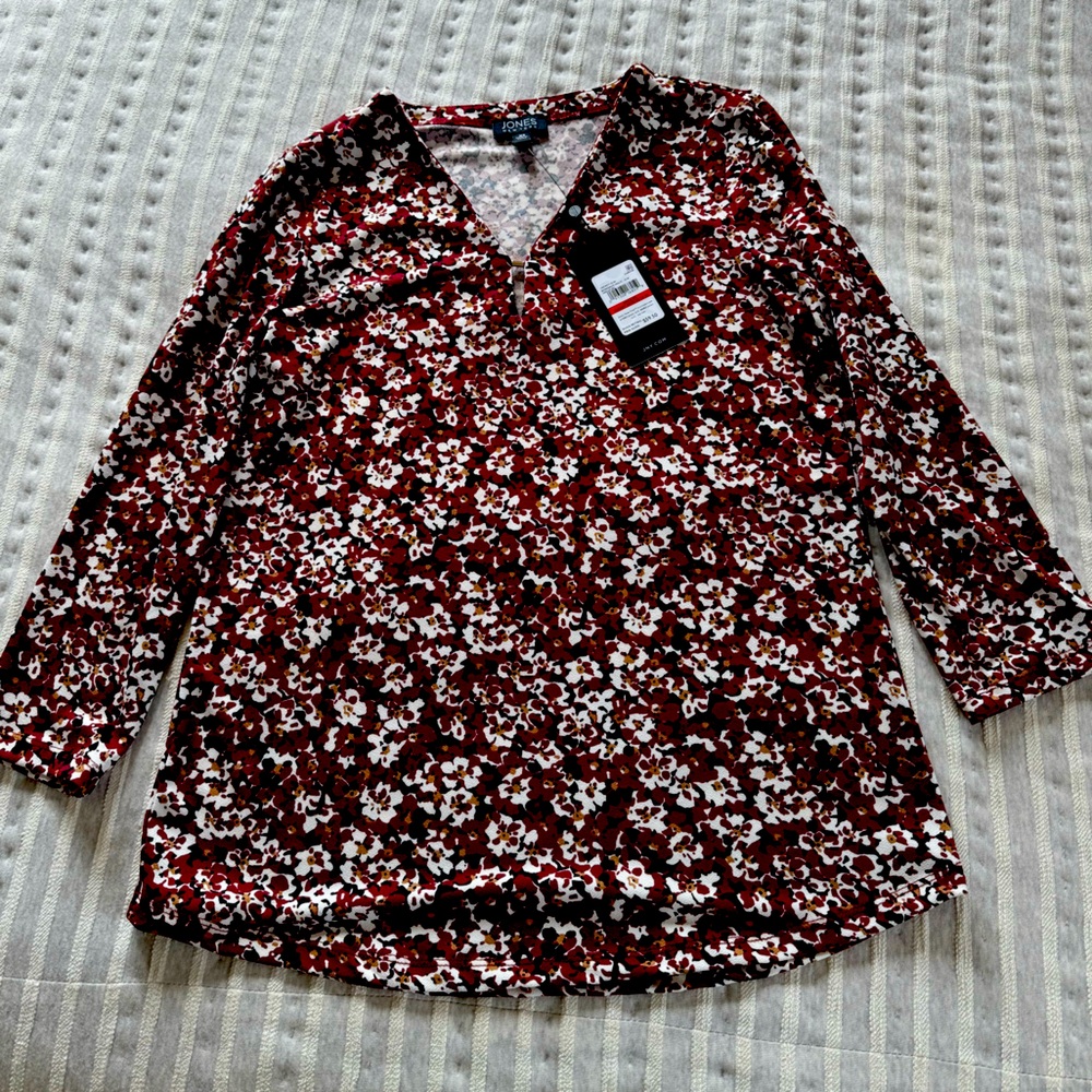 Beautiful top by Jones New York. Burgundy, cream and tan.